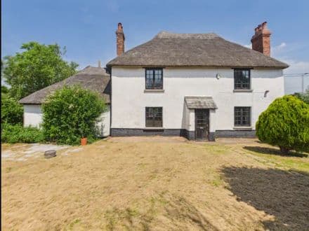 DETACHED HOUSE REQUIRING MODEST IMPROVEMENT IN VILLAGE LOCATION